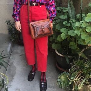 Vintage 80’s deep red Escada high waisted jeans with exclusive gold hardware